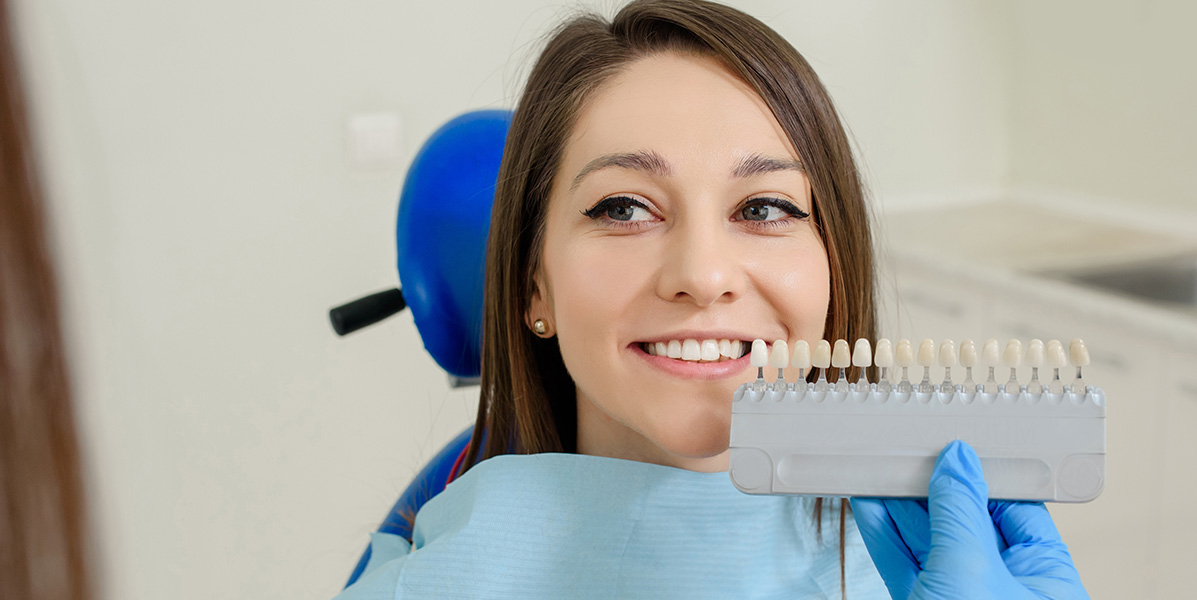 patient comparing veneer colors